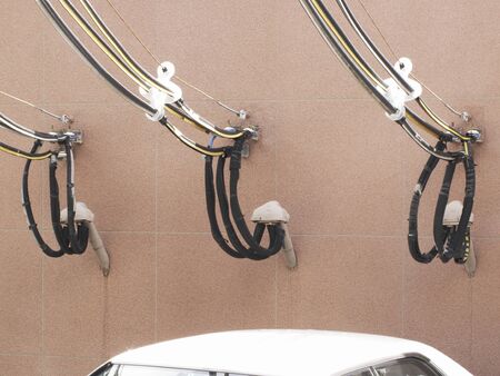 Electric wire and a wall that has been drawn into collective housingの写真素材