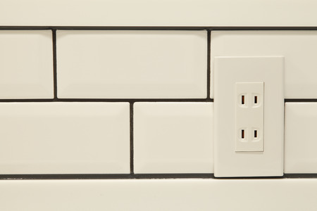 Tile and outlet
