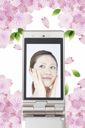 On the mobile screen Este soonの写真素材
