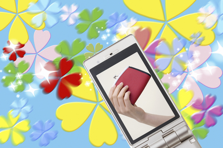 Woman with a purse projected to mobile screenの写真素材