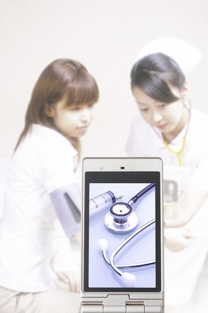 Medical utensil that goes to the nurse and the patient with the portable screenの写真素材