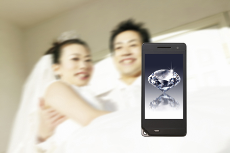 Diamond visible to the bride and groom and mobile screenの写真素材