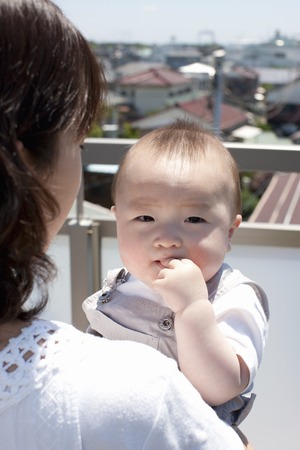 Baby's mom and smileの写真素材