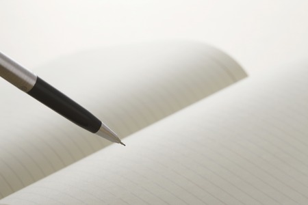 Notebook and penの写真素材