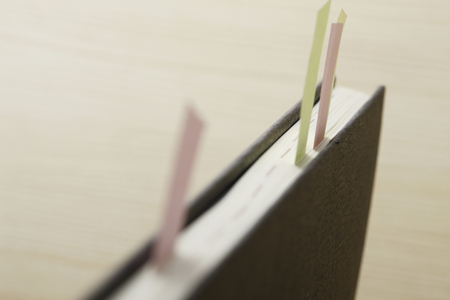 Put a sticky note schedule bookの写真素材
