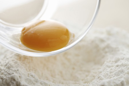 Flour and egg yolkの写真素材