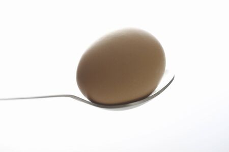 Spoon and eggの写真素材