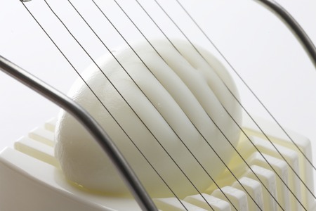 Egg cutter and boiled eggの写真素材