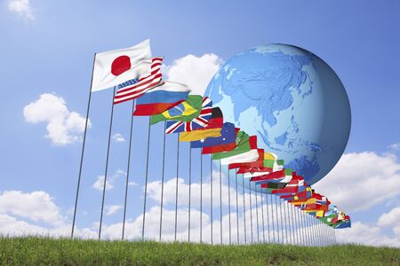 Grassland and the flags of all nations and the Earthの写真素材