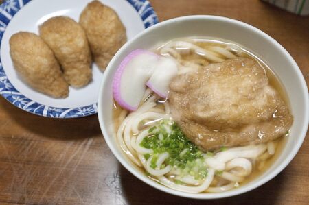 Noodle with deep-fried tofu and Inari sushiの写真素材