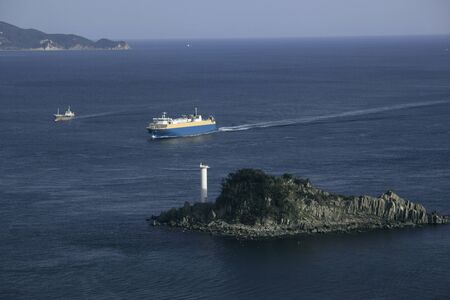Ship and Tobishima of lighthouseの写真素材
