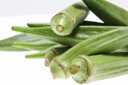 In white back and vegetables okraの写真素材