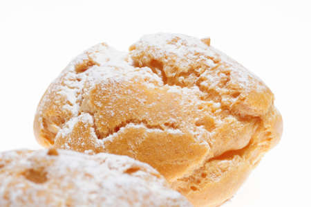 Cream puff it up in white backの写真素材