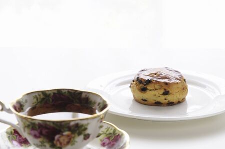 Tea and scones on the tableの写真素材