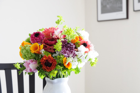 Flowers of spring put on a living room table vase flower arrangementsの写真素材
