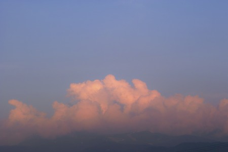 Cloud dyed to evening sunの写真素材