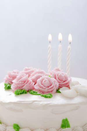It rose decoration cake and candlesの写真素材