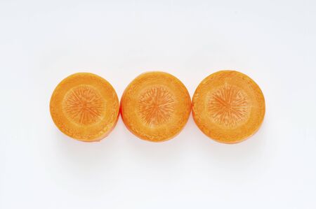 Round slices of carrotの写真素材