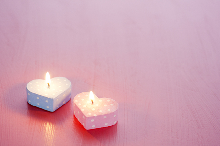 Heart-shaped candleの写真素材