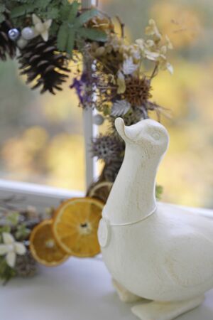Objects of Christmas wreath and white duckの写真素材