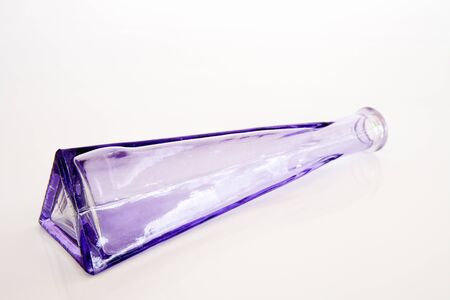 Triangle Suino lavender colored glass bottleの写真素材