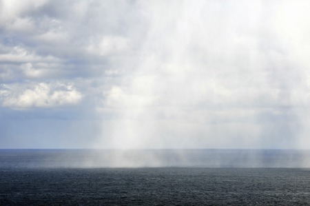 Sea of Japan and the rain cloudsの写真素材