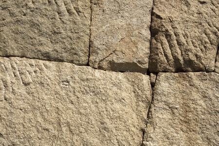 Stone wall of the foundation of the building