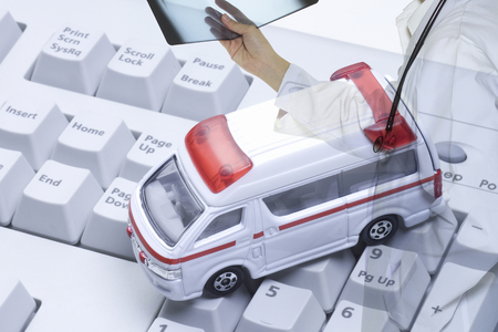 Synthesis of ambulance of female doctor and toys with the X-ray filmの写真素材