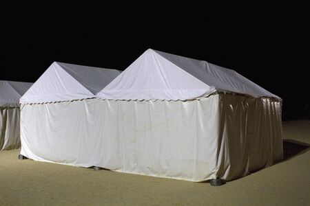 White tent that was erected on the night of parkの写真素材