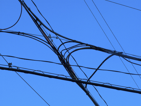Silhouette of electric commercial wiring of residential area