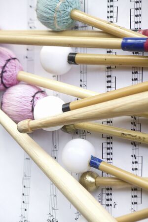Percussion of the stick and score