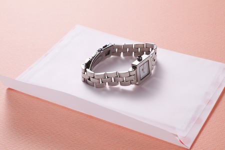 Envelope and watchの写真素材