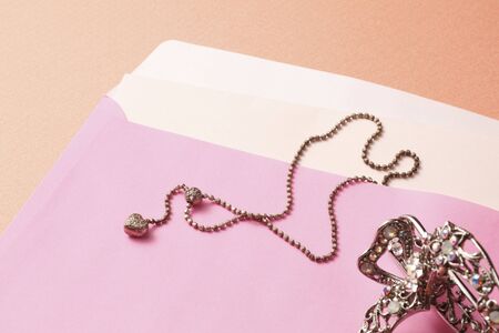 Pink envelope and accessories