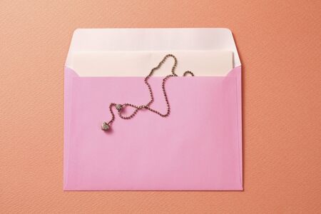 Pink envelope and accessories