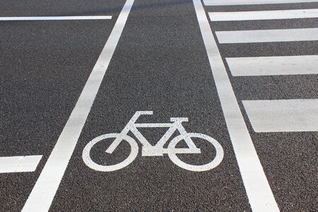 Next to the bike path of crosswalk
