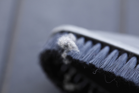 Dust accumulated on the back of the chest of drawersの写真素材