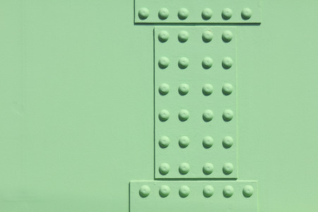 Iron plate and bolt to reinforce the weight steel frameの写真素材