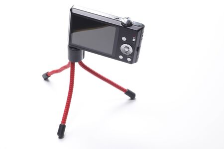 Compact digital cameras with mini tripod