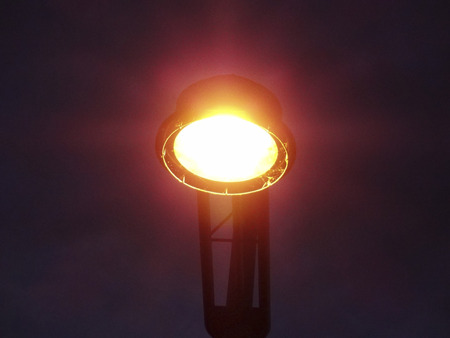 Street lights that illuminate the street corner