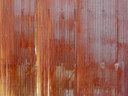 Factory of rusty corrugated iron wallの写真素材
