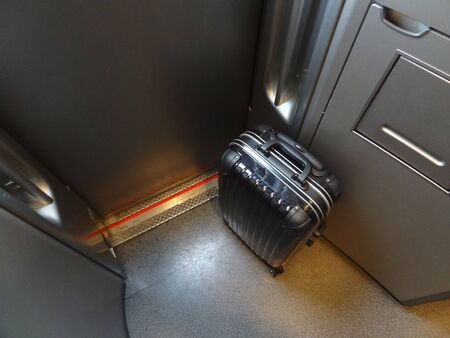 Shinkansen Nozomi car and suitcaseの写真素材