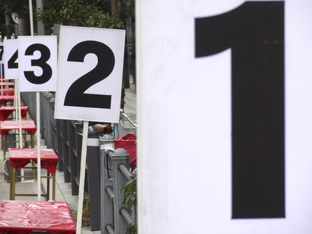 Number tag of the water supply point of marathonの写真素材