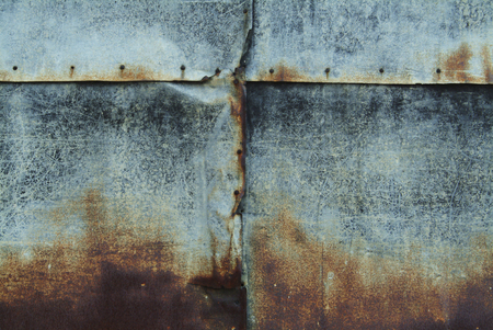 An old tin wallの写真素材