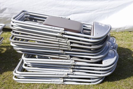 The stacked folding chairの写真素材