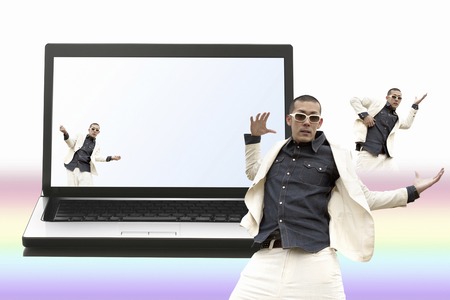 Men dance the laptop and danceの写真素材