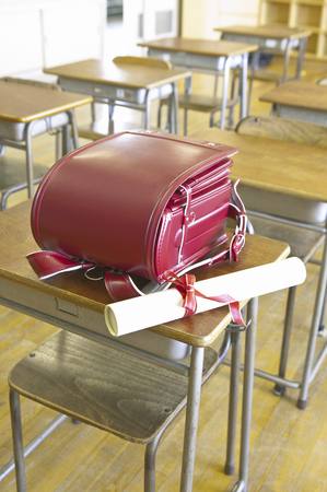 School bag and diplomaの写真素材