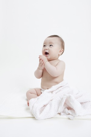 Wearing a diaper babyの写真素材