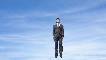 Businessman jumpingの写真素材
