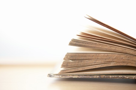 Book of antique placed by the windowの写真素材