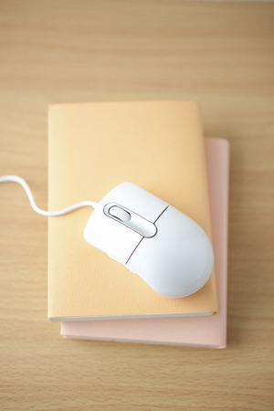 Mouse was placed on the bookの写真素材